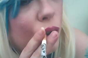 A Blonde BBW Mistress Tina Snua Smoking A Cork Discolour More Drifts