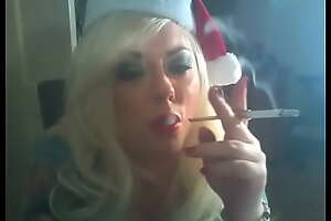 BBW Santa Tina Snua Smokes A Filterless Cigarette Using A Holder - Christmas