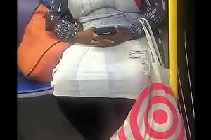 Big breasted Negro woman on bus